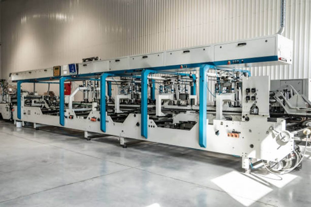 folding gluing and stitching machine (Caida Machinery)